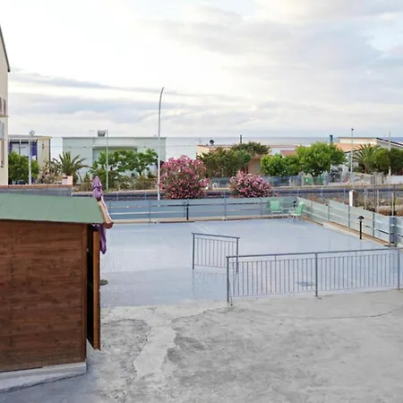 Seaside Marina Retreat: 2br With Pool & Beach Access Apartment
